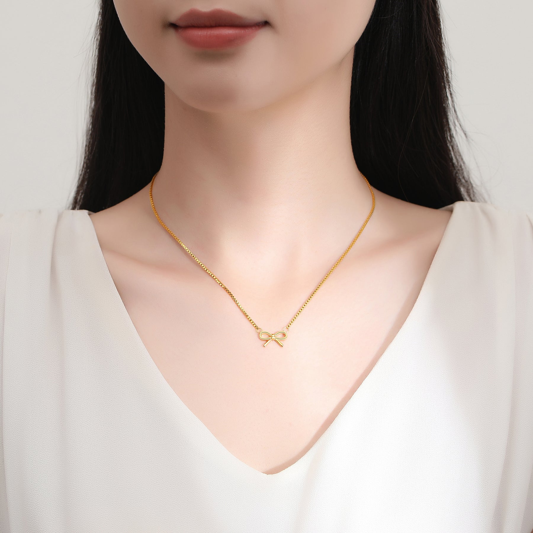 BOW PENDANT NECKLACE