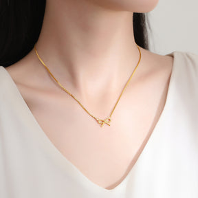 BOW PENDANT NECKLACE