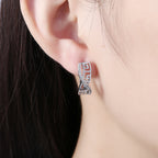 Twist CZ Hollow Out Studs