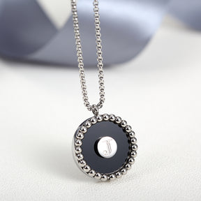 SURROUND BALLS BLACK CIRCLE PENDANT NECKLACE